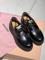 Лоферы Miu Miu женский кожа черный 130385-6