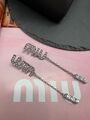 Серьги Miu Miu графитовый 175335-1