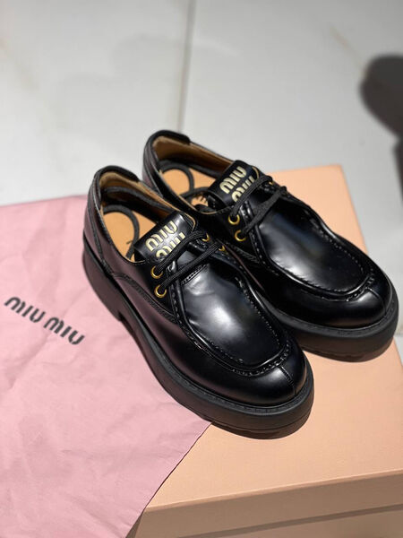 Лоферы Miu Miu женский кожа черный 130385-2