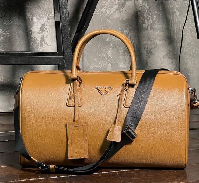 Дорожная сумка Prada мужской кожа swift светло-желтый 19283