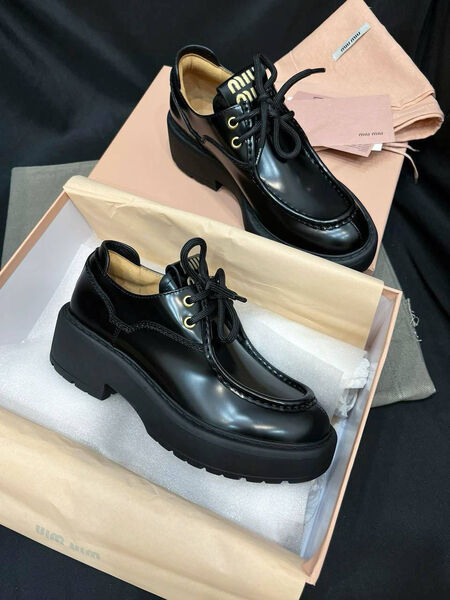 Лоферы Miu Miu женский кожа черный 130385-7