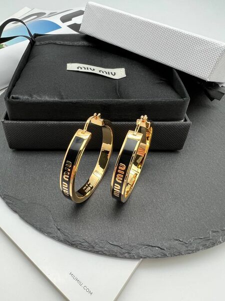 Серьги Miu Miu черный,белый 175874