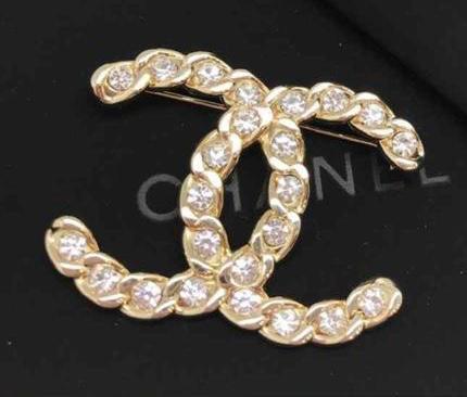 Брошь Chanel золотой 10373