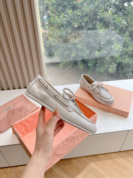 Лоферы Miu Miu женский кожа бежевый 138164-3