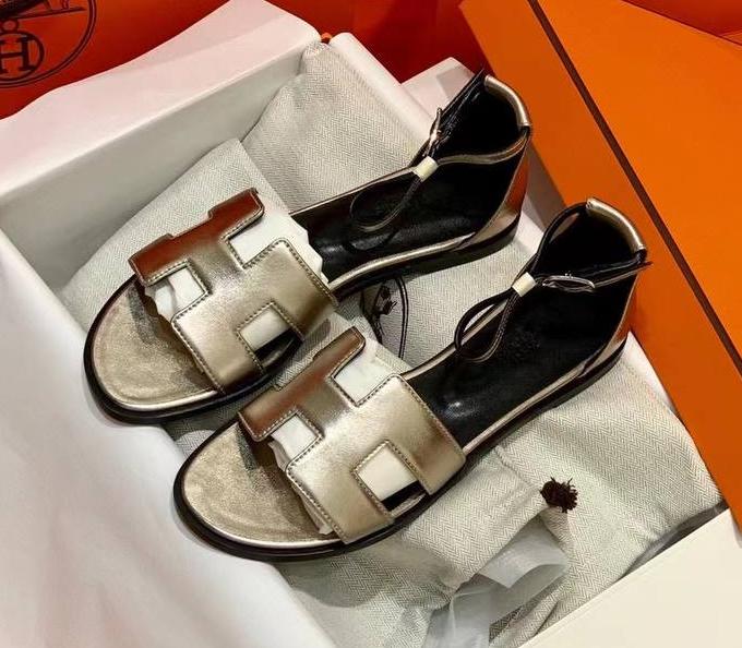 Босоножки Hermès женский кожа бронзовый 4821