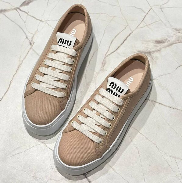 Кеды Miu Miu женский текстиль бежевый 148767